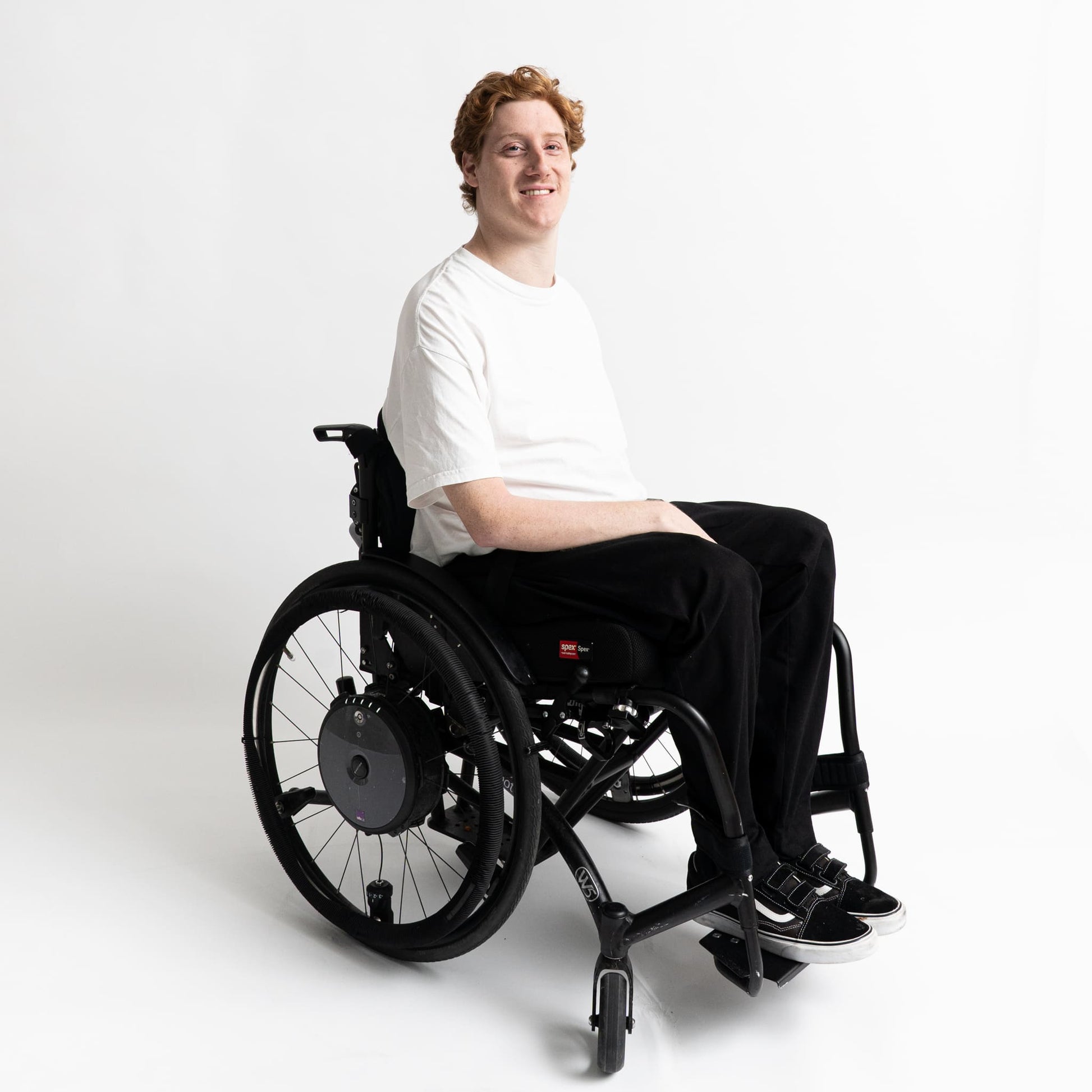 “side view of adaptive pants with no rear seams or pockets, designed to reduce pressure risks.”