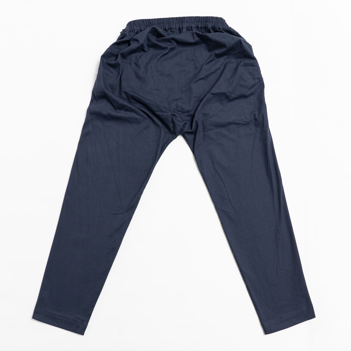 back view of pants showing no seams or pockets
