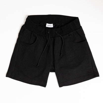 Black shorts with drawstring on a white background